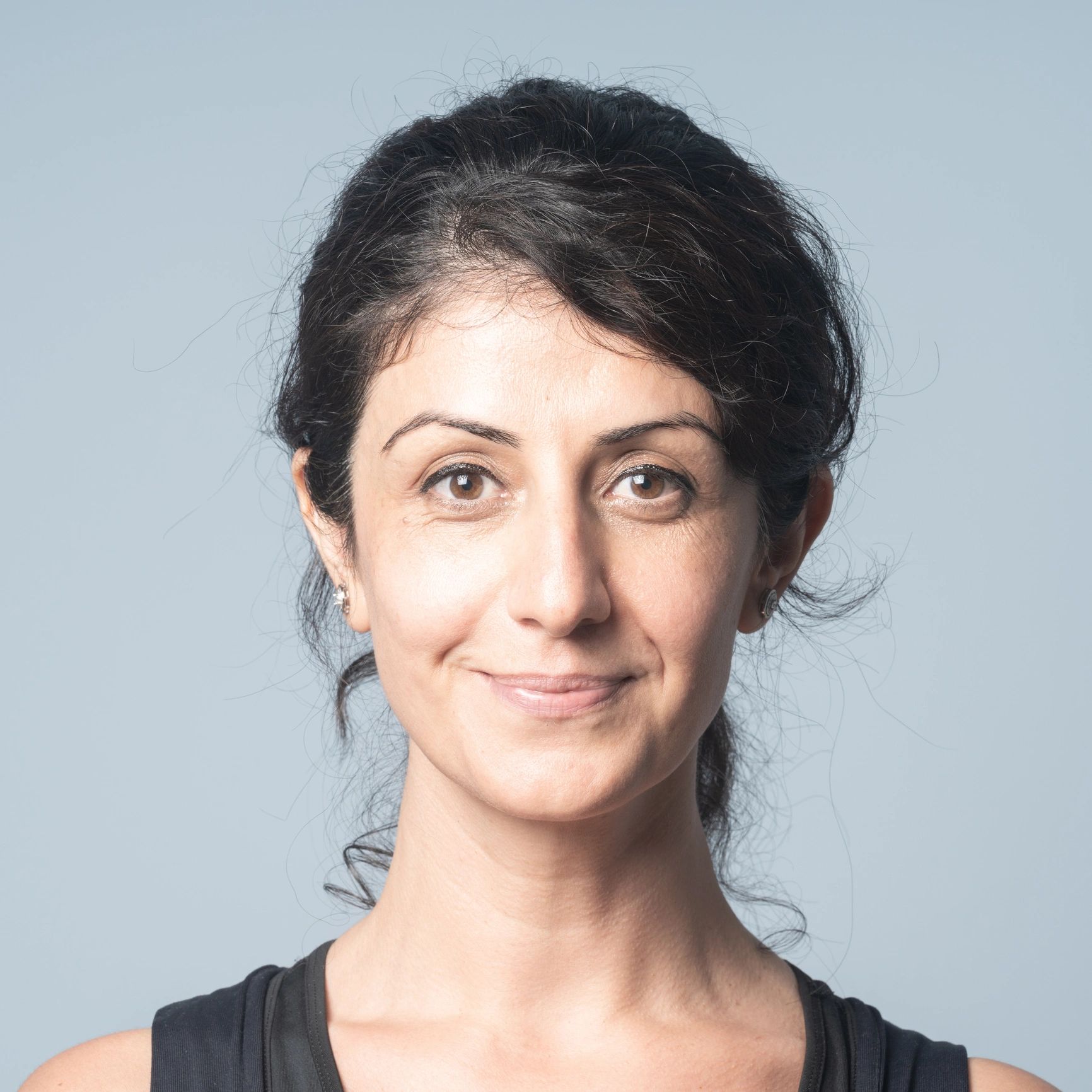 Professional headshot of a clinician leader.