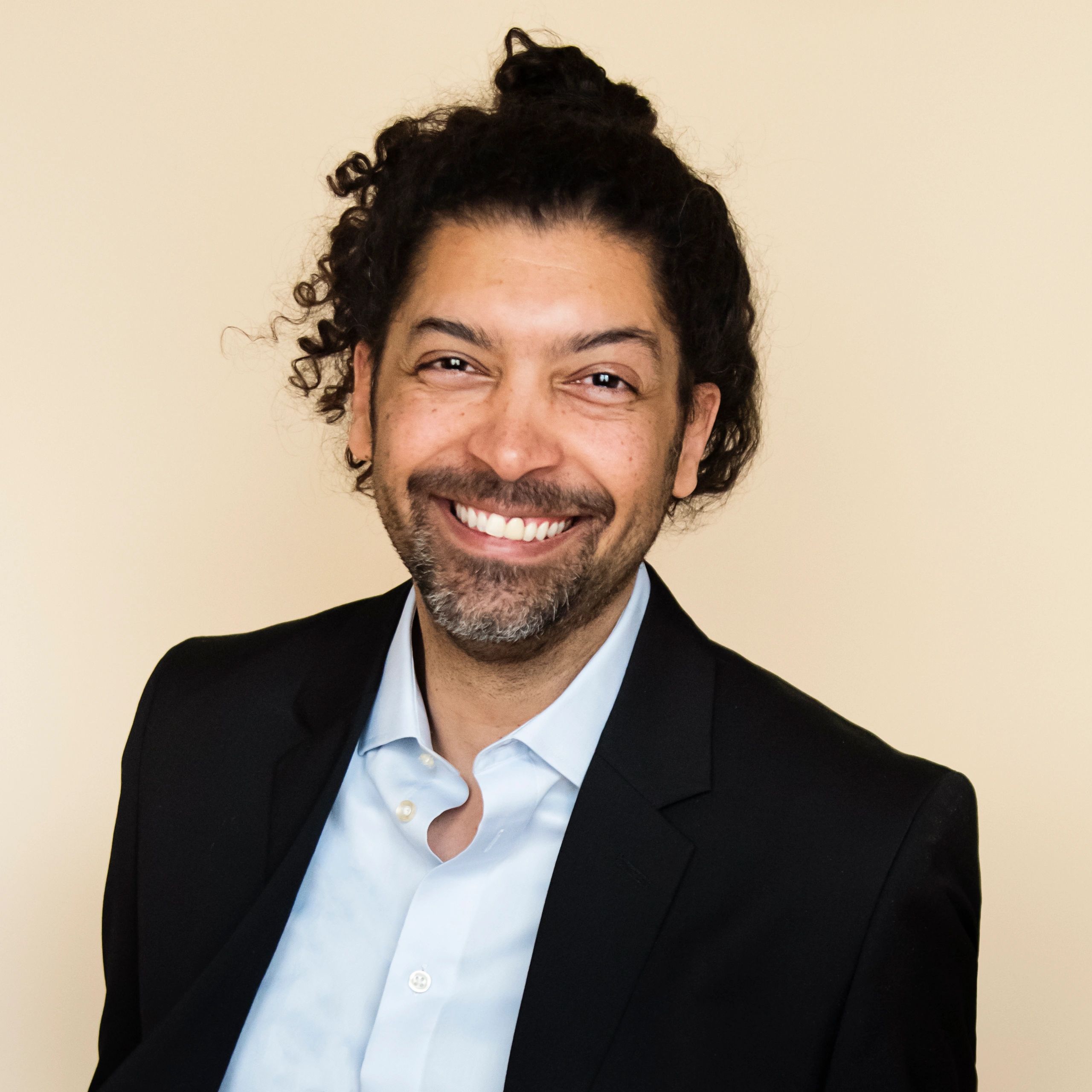 Professional headshot of a research leader.